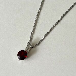 Elegant Silver Necklace with Red Gemstone